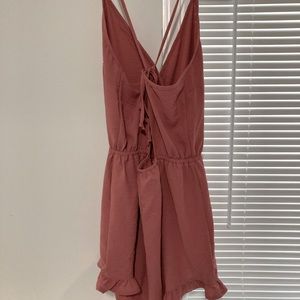 V neck romper with ruffle bottom